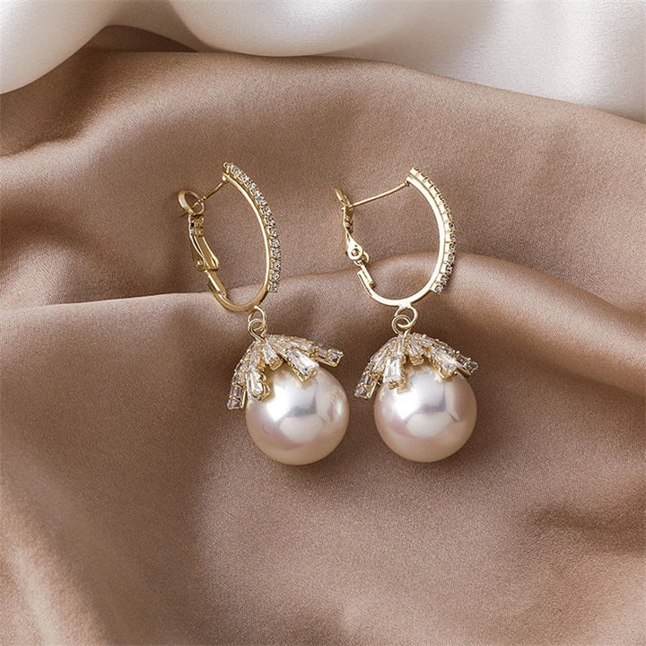 Xandra | Elegante Hängeohrringe mit hochwertiger Perle