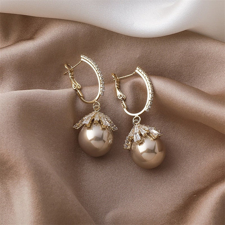 Xandra | Elegante Hängeohrringe mit hochwertiger Perle
